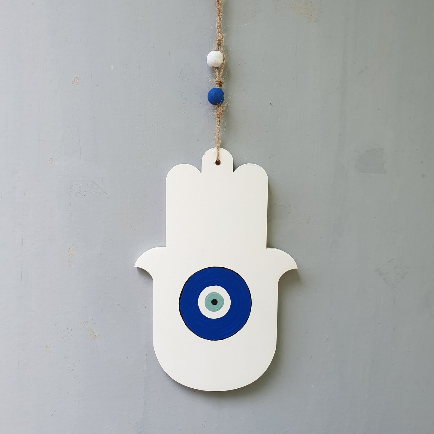 Astar | חמסה מעוצבת לקיר עם עין כחולה בעבודת יד