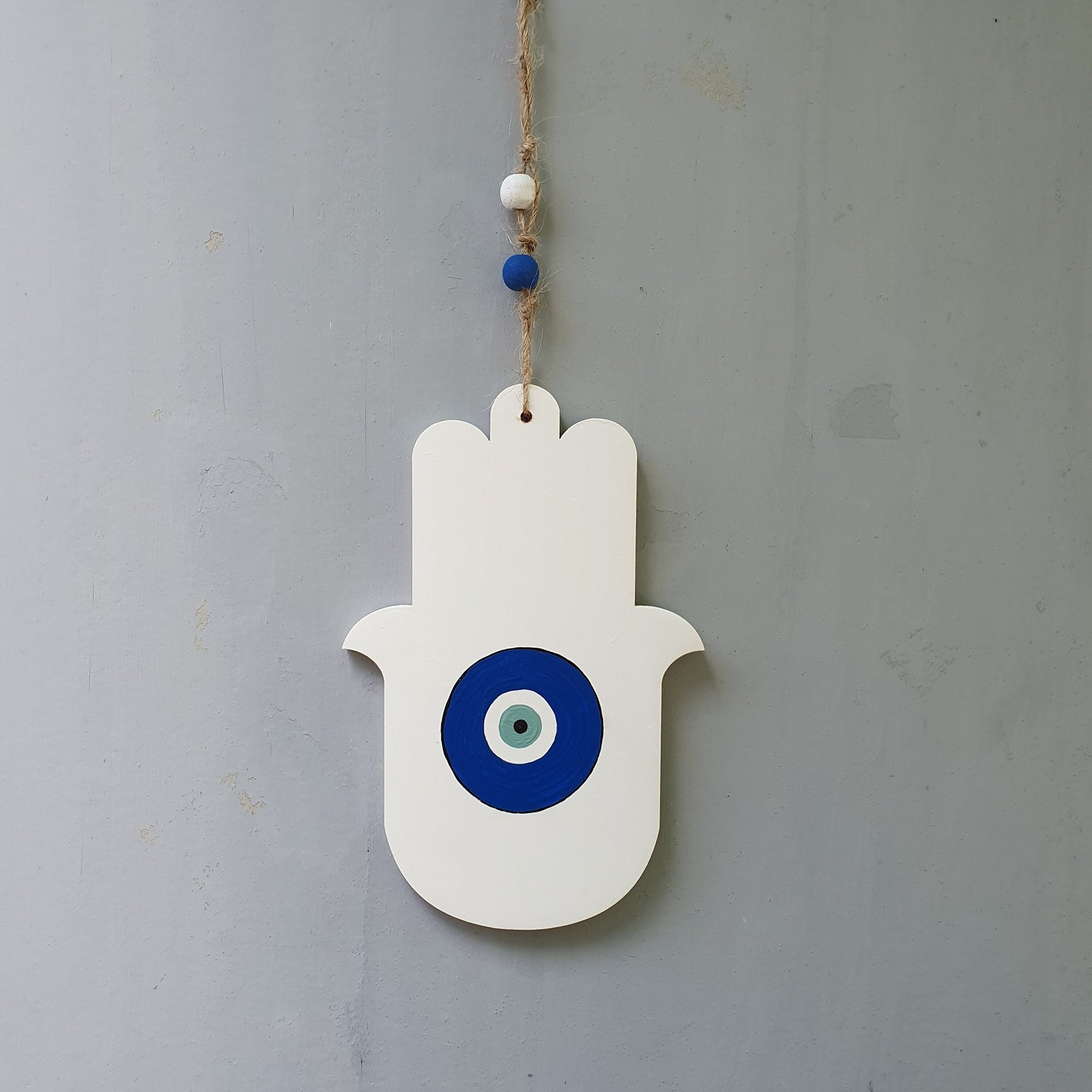 Astar | חמסה מעוצבת לקיר עם עין כחולה בעבודת יד